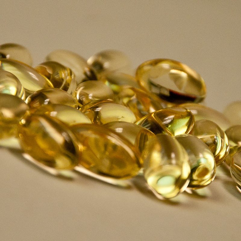 CBD capsules close-up (illustrative)