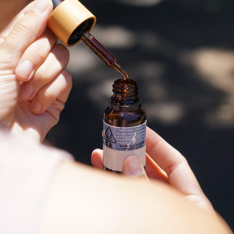 CBD oil dropper close-up (illustrative)